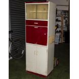 A vintage kitchen cabinet.