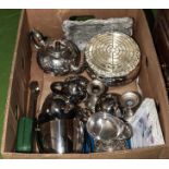 A box containing silver plated items