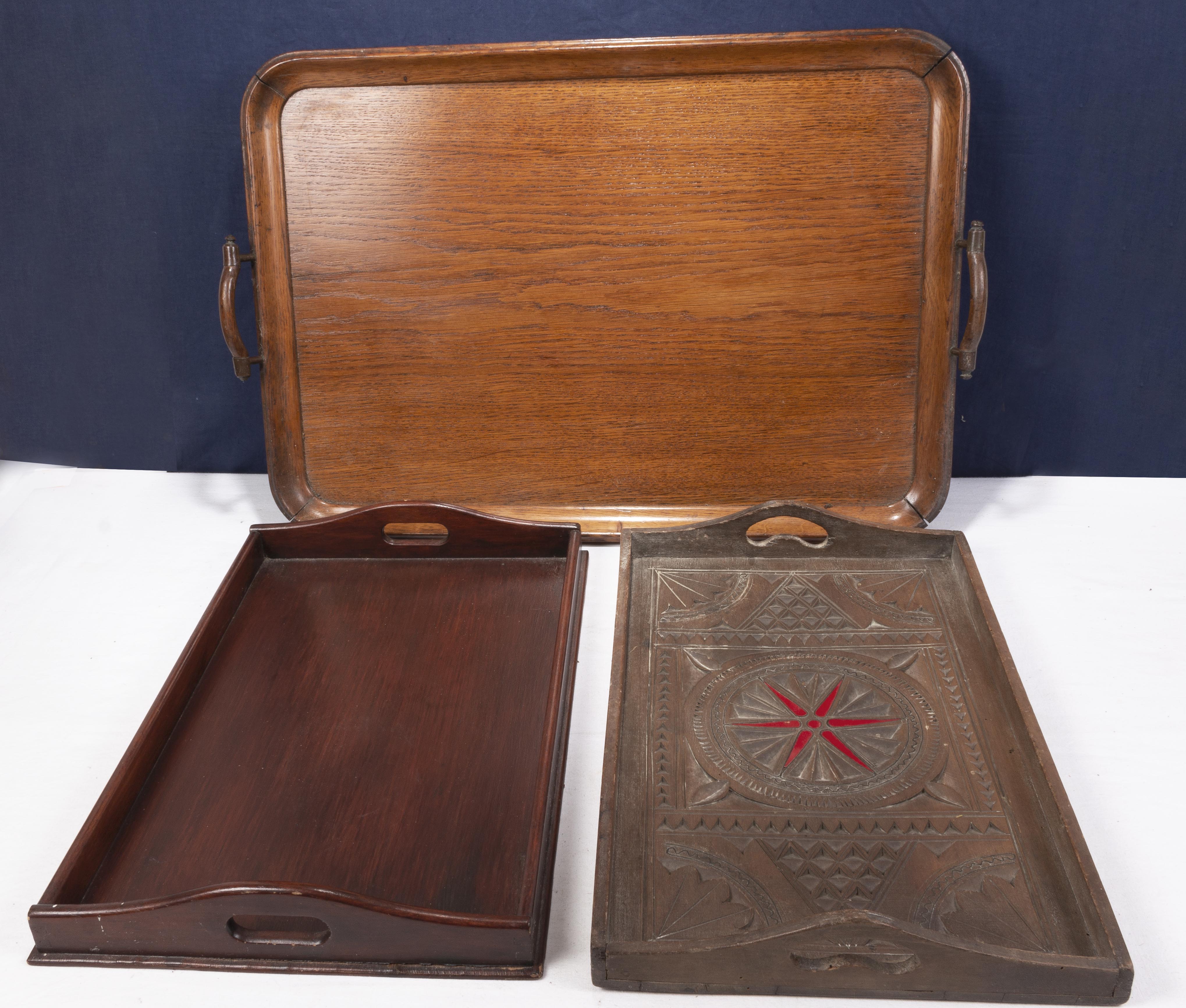 Three wooden tea trays