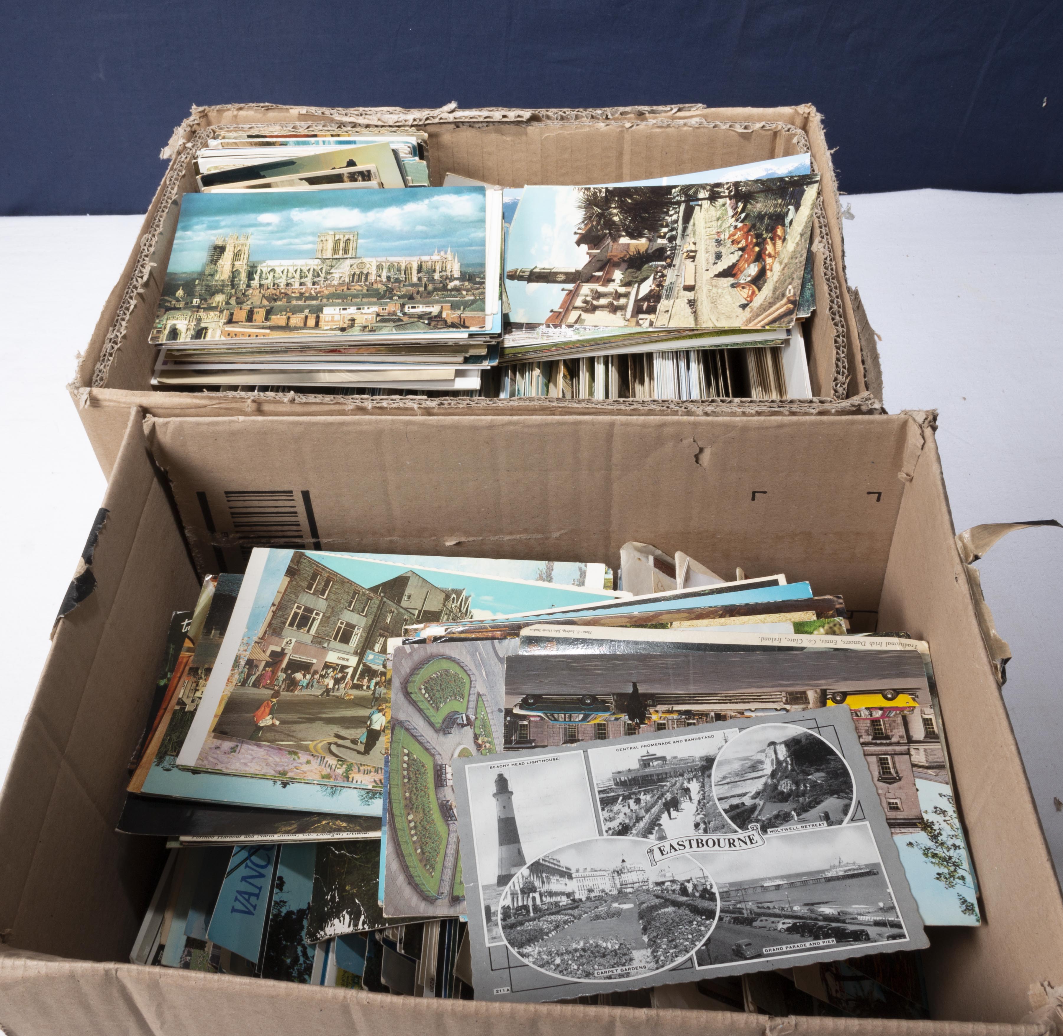 Two boxes of postcards