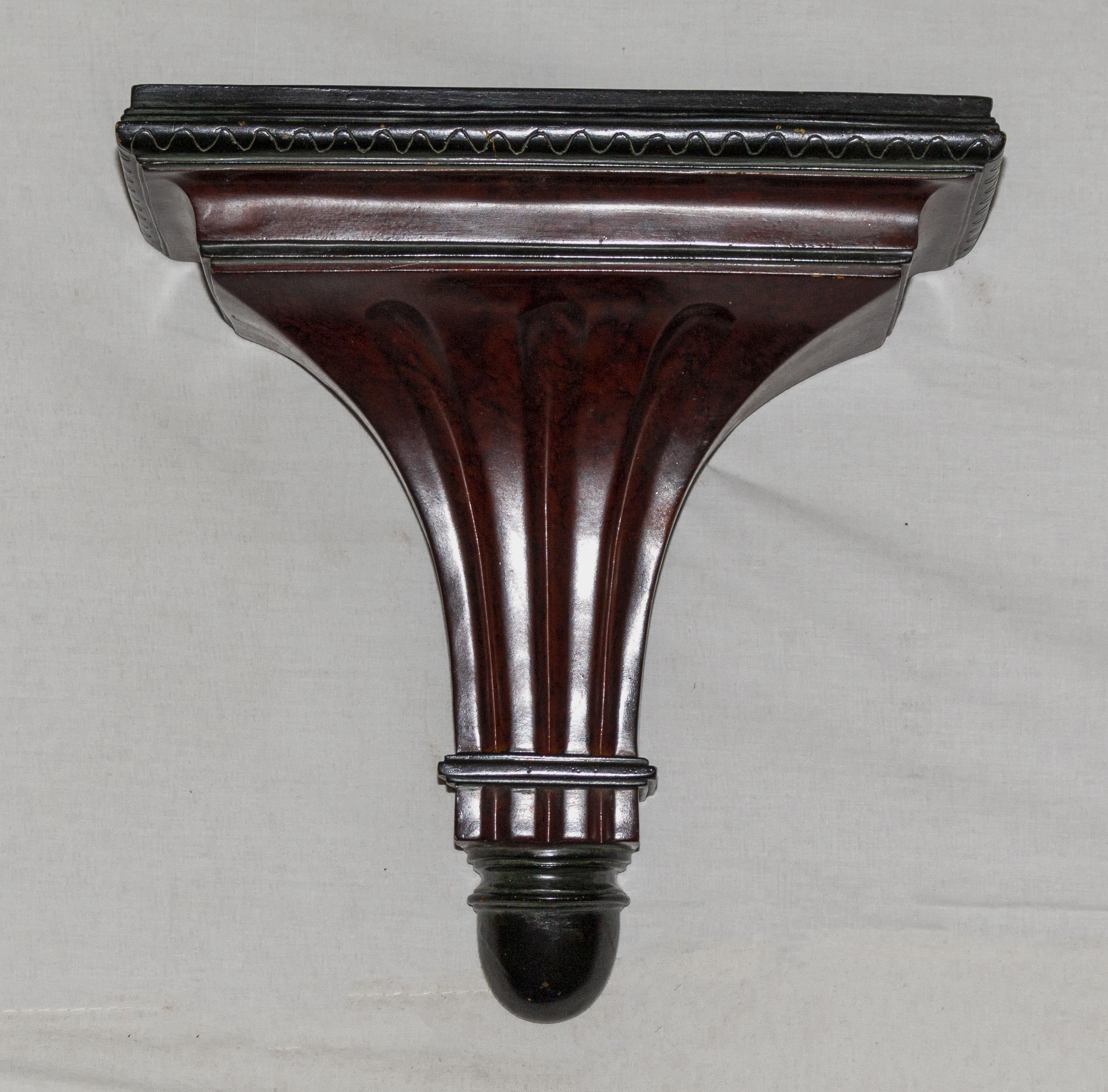 A reproduction wall bracket
