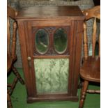 A glass fronted cabinet