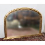 A gilt framed over mantle mirror