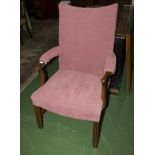 An upholstered arm chair