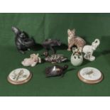 A collection of pottery animals