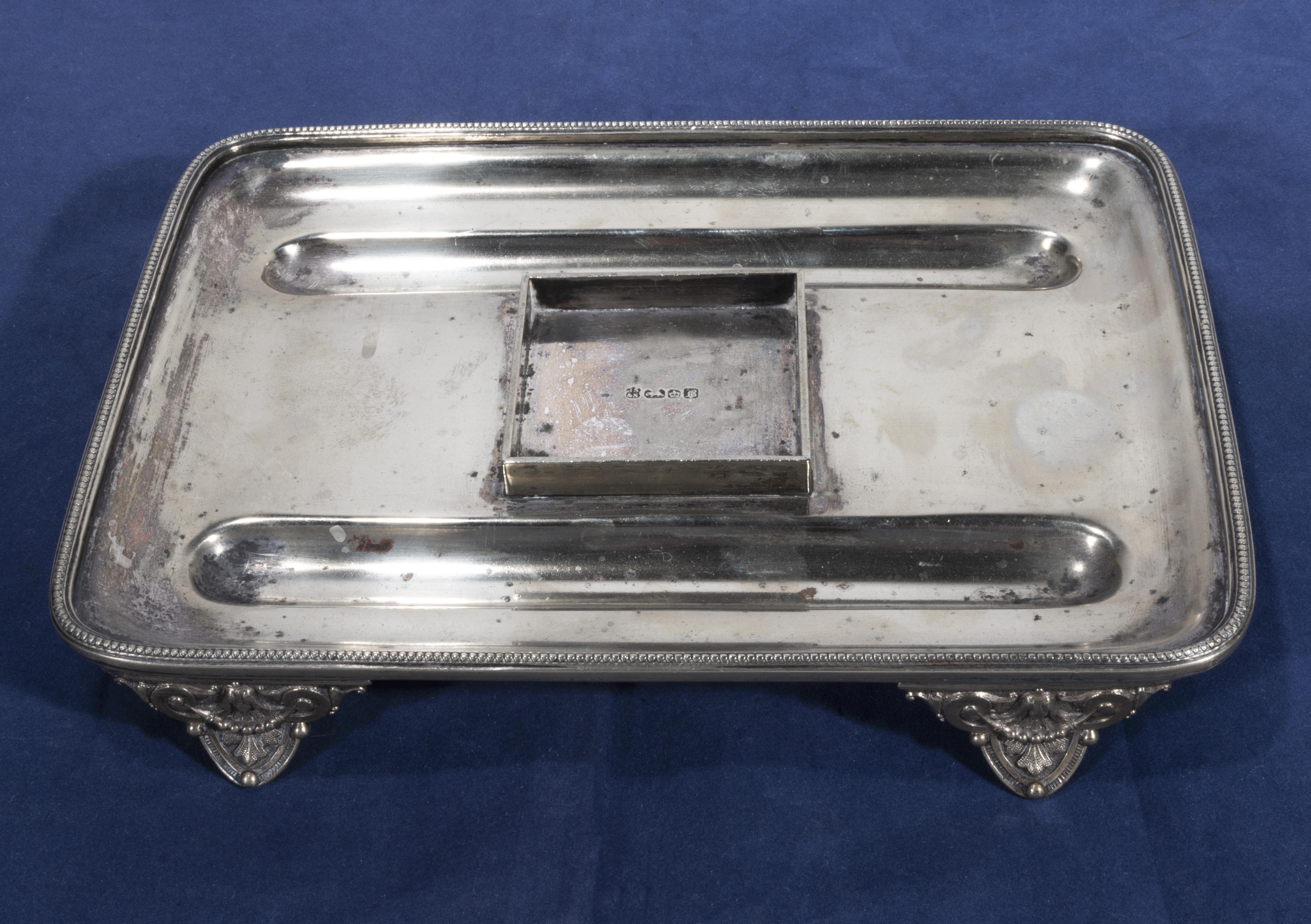 A silver plated pen tray