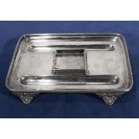 A silver plated pen tray