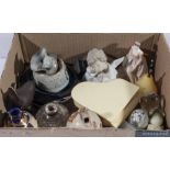 A box containing small collectable pottery items