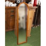 A pine framed wall mirror