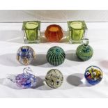 Six glass paperweights, three candle holders and a swan