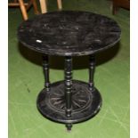 A circular black table.