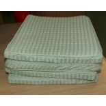 Four chair cushions