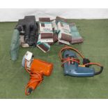 Bosch drill, Atlas belt sander and sanding belts together with a Black and Decker hand grinder