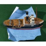A Bildajig No.0 3D jigsaw of a cargo boat, 7" long. (two pieces missing)