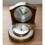 A mantle clock and a barometer