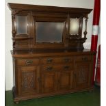 A good quality late Victorian oak sideboard with mirror back.