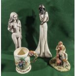 Three figures and a tankard