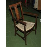 An Edwardian inlaid mahogany armchair