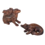 A Hardwood crocodile and a dog with pup netsuke