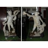 A pair of carved stone figures of the seasons Putti style circa 1700 probably Flemish .42 inches (