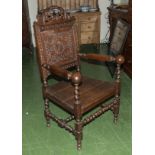 A carved oak Wainscot style chair