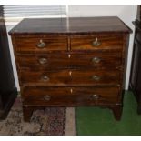 A Georgian mahogany chest of two drawers over three