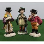 Three miniature Dicken's character figures