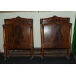 A pair of Victorian mahogany single beds