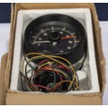 A vintage boxed tachometer by Yazaki