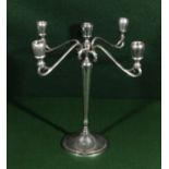 A plated candelabra.