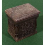 A 19th-century intricately carved hardwood box