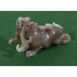 A Chinese jade carving of a mythical beast