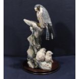 A Teviotdale figure group of Peregrine Falcon and chicks, modelled by D Edelmann and D Moore