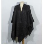 A black mohair cape