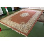 A large Chinese carpet.18ft by 12 ft.