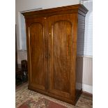 A Victorian mahogany wardrobe fitted interior