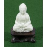 A small Chinese figure of Buddha