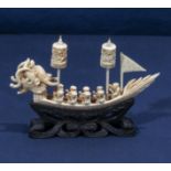 A Chinese ivory dragon boat 5 inch long.
