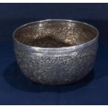 A Chinese antique silver embossed bowl with figures, Chinese touch marks to base, 7 inches diameter,