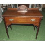 An Edwardian mahogany desk