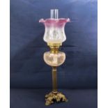 A Victorian oil lamp.