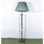 A brass standard lamp with onyx base