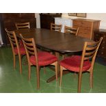 An Ercol table and six chairs