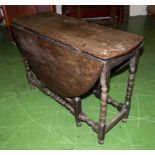 An oak gateleg table