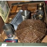 A box containing metal ware and wooden items