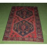 An Old Baluchi rug 136cm x 87cm