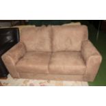 A suedette two seater sofa