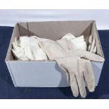 A box containing lady's vintage gloves