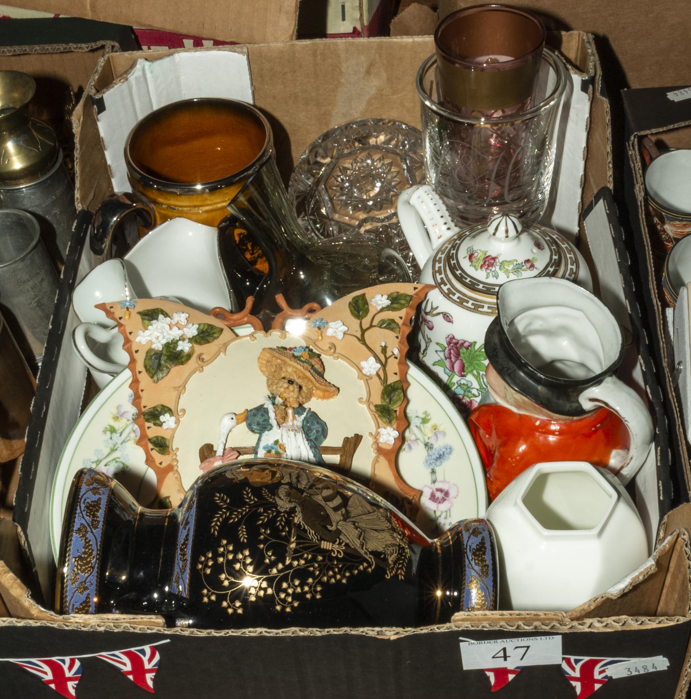 A box containing assorted pottery and glass