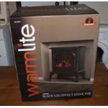 A Warmlite 2000W black log effect stove fire